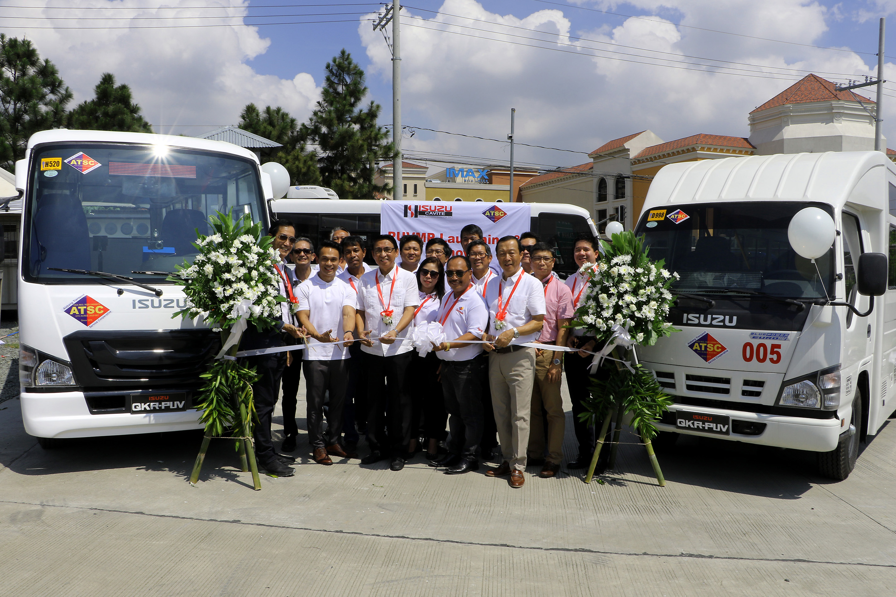 Ribbon cutting isuzu