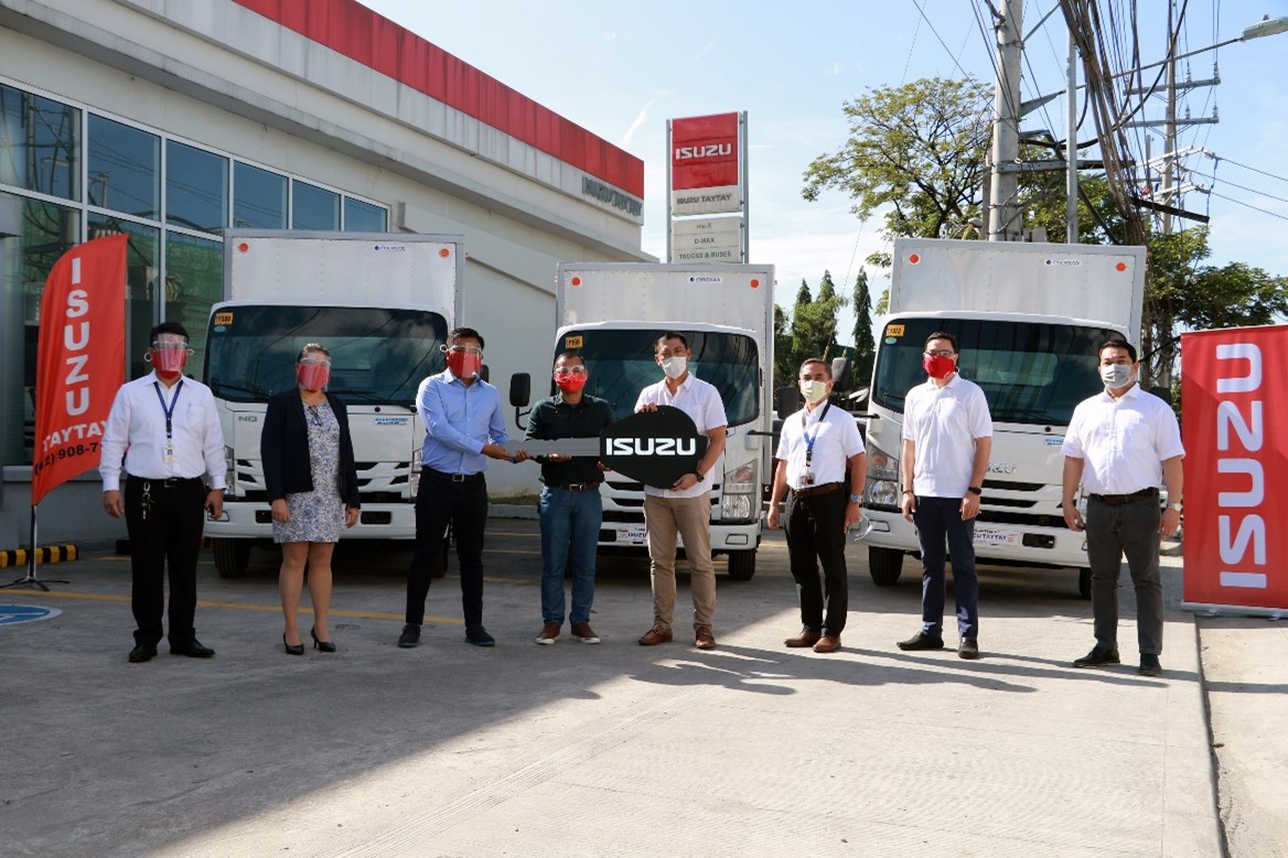 Isuzu PH completes turnover of 46 N-Series trucks to First PGMC Enterprises Inc., an affiliate of Nutriasia Inc. image