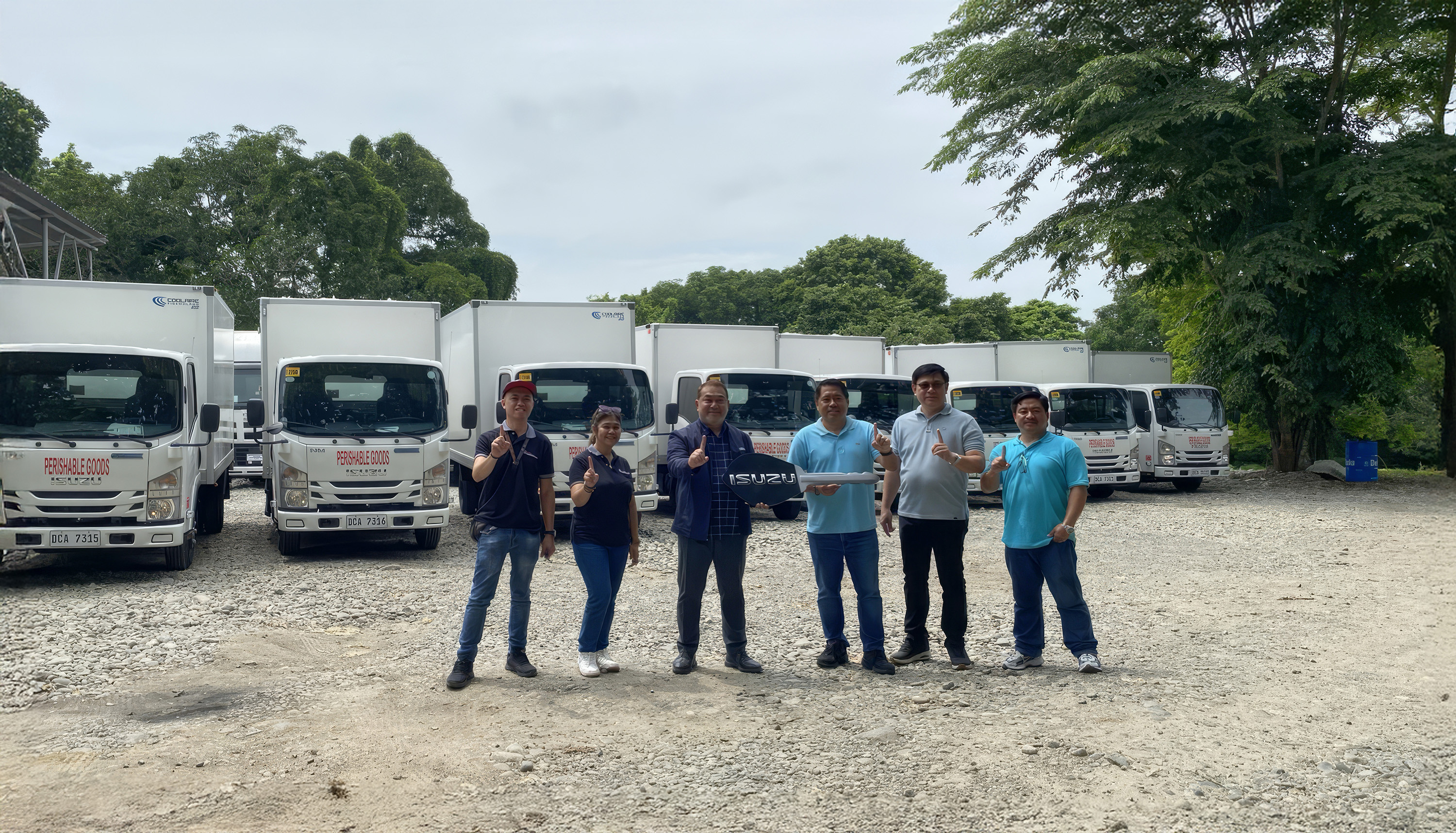 Partner in Progress: Isuzu Philippines Expands Rainbow Asia Logistics  Fleet with 10 New NMR85H Trucks image
